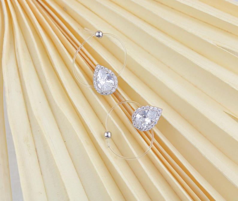 Floating Pear Shaped Ring in Sterling Silve